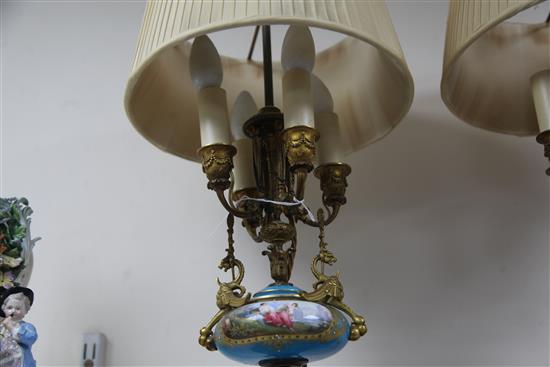 A pair of Sevres style porcelain and ormolu mounted table lamps, late 19th century, total height 60cm